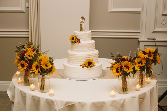 yellow burgundy wedding cake